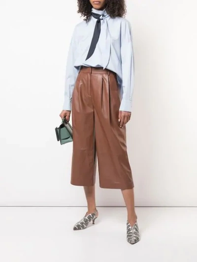 Shop Tibi Stella Leather Cropped Trousers In Brown