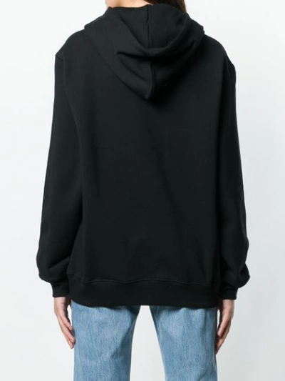 Shop Moschino Logo Hooded Sweatshirt In Black