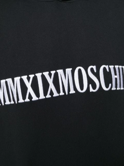 Shop Moschino Logo Embroidered Hoodie In Black