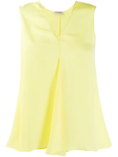 Shop Blanca Sleeveless Flared Top In Yellow