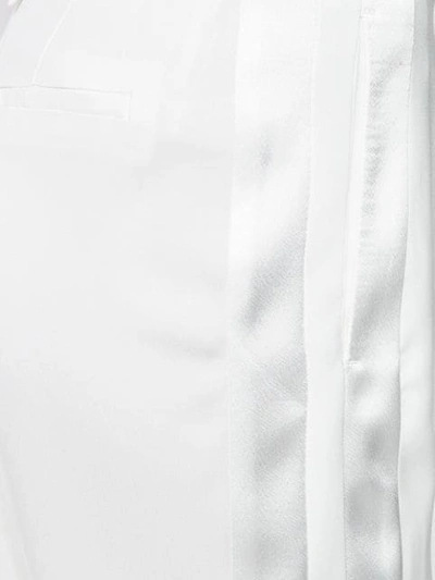 Shop Leqarant Tapered Trousers In White