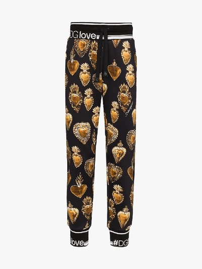Shop Dolce & Gabbana Sacred Heart Print Cotton Trousers In Black