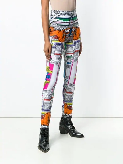 Shop Versace Harlequin Print Leggings In White