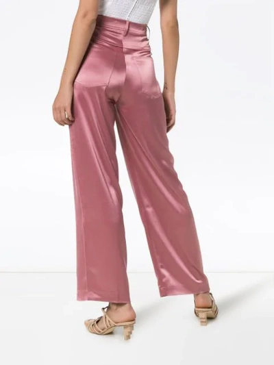 Shop Nanushka Marfa Satin Trousers In Pink