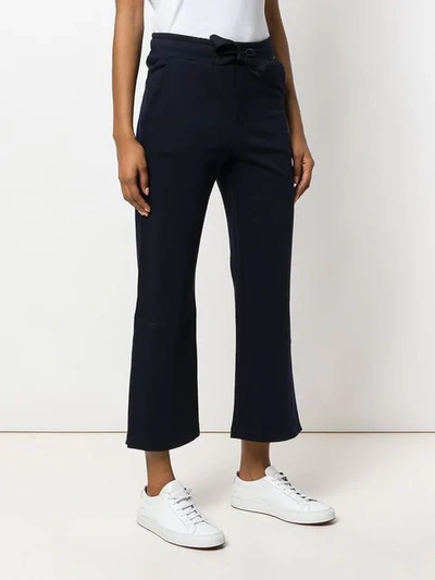 Shop Moncler Drawstring Flared Trousers In Blue