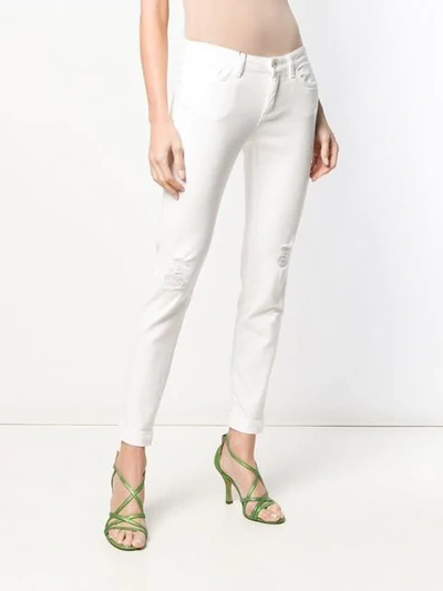 Shop Dolce & Gabbana Classic Skinny Jeans In White