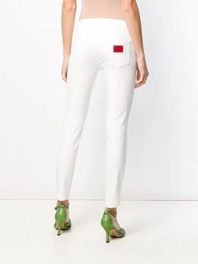 Shop Dolce & Gabbana Classic Skinny Jeans In White