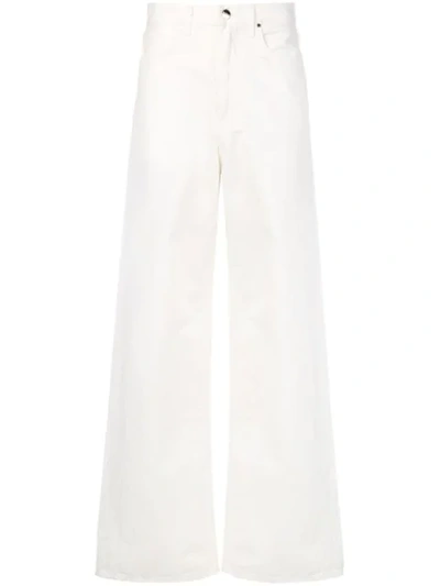 Shop Goldsign Super Flared Jeans In White