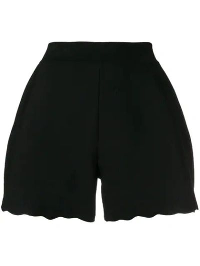 Shop Alexander Mcqueen Scallop Hem Shorts In Black