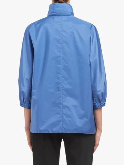 Shop Prada Feather Nylon Rain Jacket In Blue