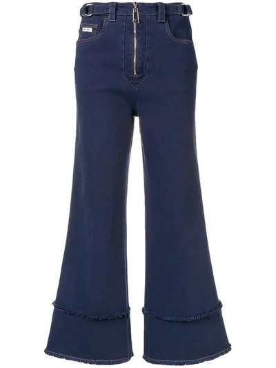 Shop Miu Miu Frayed Details Flared Jeans In Blue