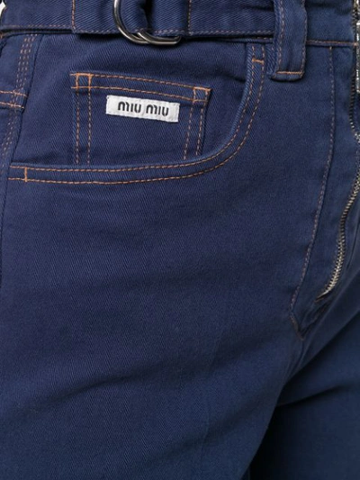 Shop Miu Miu Frayed Details Flared Jeans In Blue