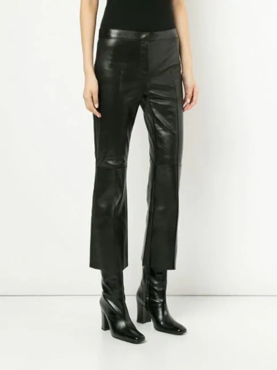 Shop Alexander Mcqueen Flared Trousers In Black