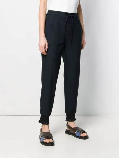 Shop 3.1 Phillip Lim / フィリップ リム Tapered Pinstriped Trousers In Black