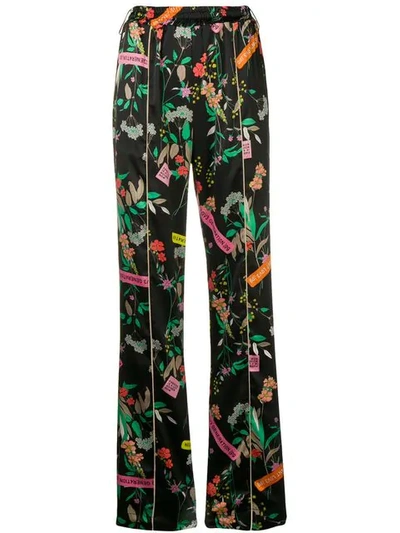 Shop Pinko Floral Print Trousers In Black
