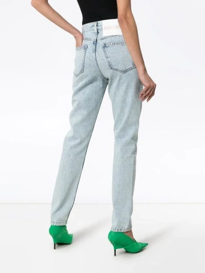 Shop Calvin Klein Jeans Est.1978 Low Rise Slim Leg Jeans In 911 Blue