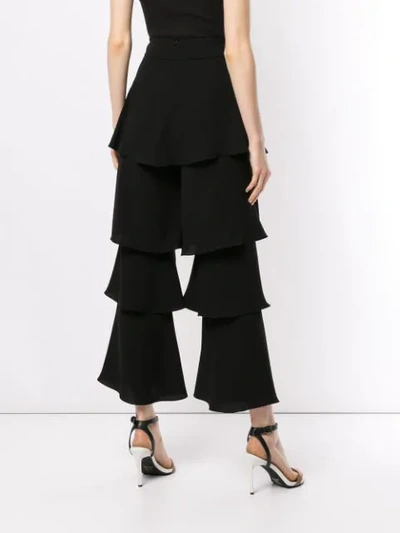 Shop Osman Felix Trousers In Black