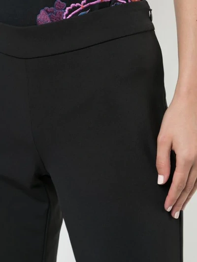Shop Josie Natori Slim Cropped Trousers In Black