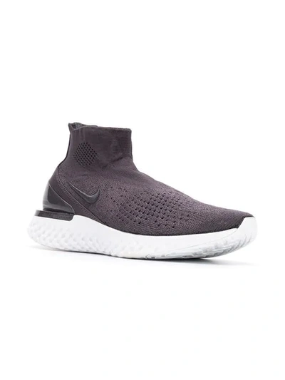 Shop Nike Rise React Flyknit Sneakers In 004 Grey