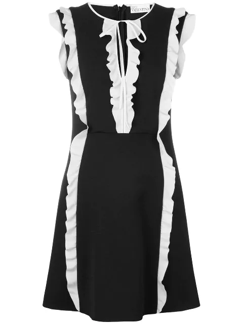 black dress with white ruffle
