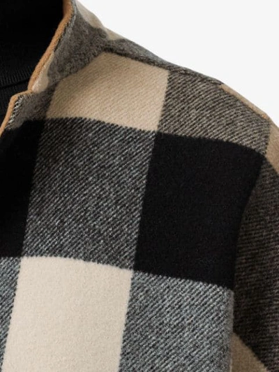 Shop Burberry Reversible Check Poncho In Brown