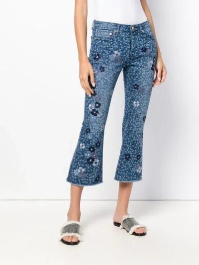 Shop Michael Michael Kors Floral Printed Flared Jeans In Blue