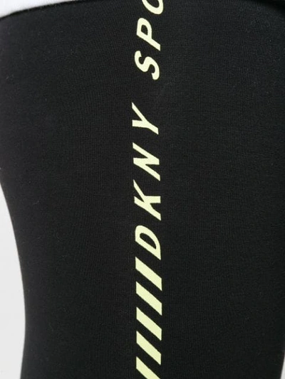 Shop Dkny Logo Stripe Leggings In Black