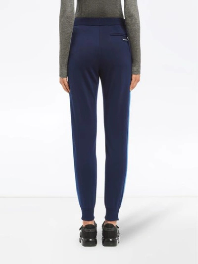 Shop Prada Technical Jersey Trousers In Blue