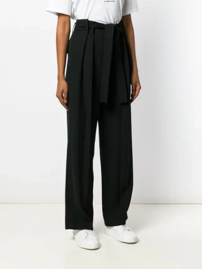Shop Vince Belted Pleated Trousers In Black
