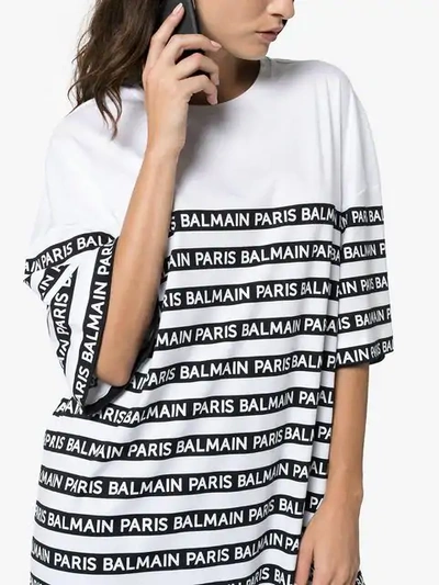 Shop Balmain Oversized Logo Stripe Print Cotton T Shirt In White