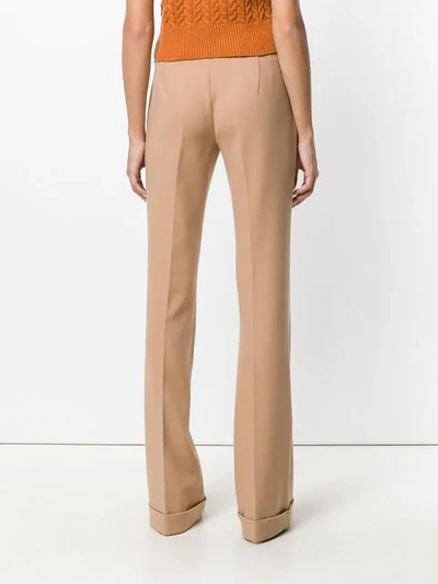 Shop Miu Miu Bootcut Tailored Trousers In Pink