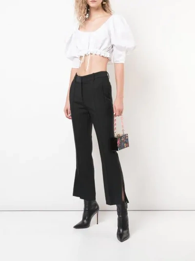 Shop Khaite Side Slits Trousers In Black