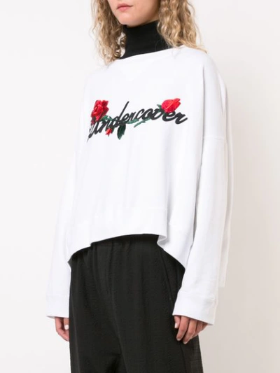 Shop Undercover Embroidered Curved Hem Sweatshirt In White