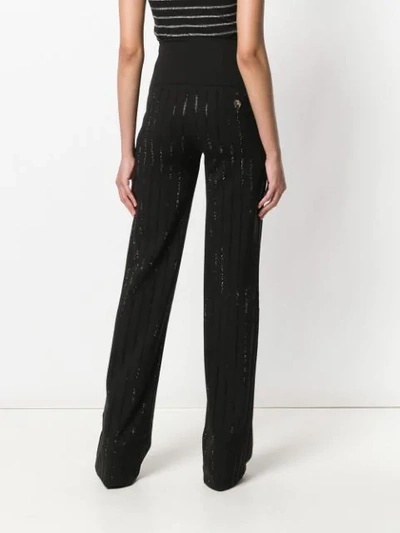 Shop Philipp Plein Strass Flared Trousers In Black