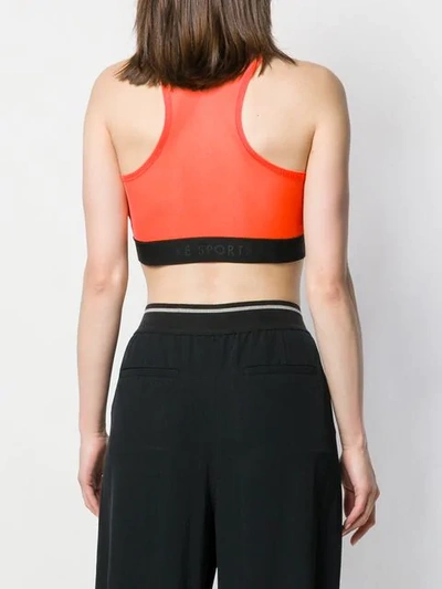Shop Nike Sheer Crop Top In Orange