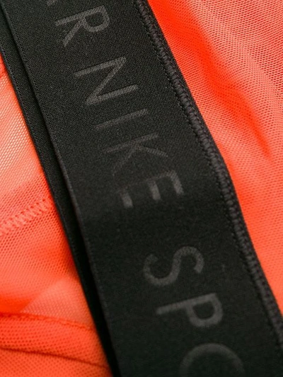 Shop Nike Sheer Crop Top In Orange