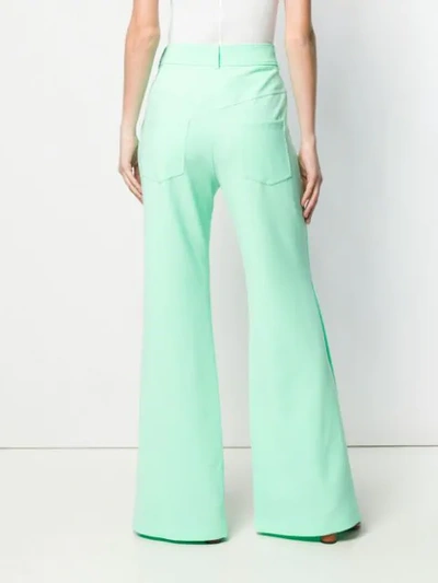 Shop A.w.a.k.e. Flared Trousers In Mint