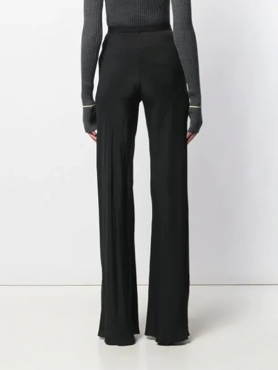 Shop Rick Owens Flared Trousers In Black