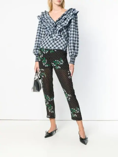 Shop Ganni Floral Dotted Trousers In Black