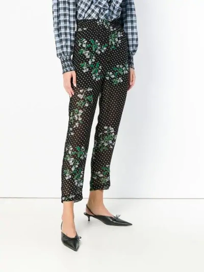 Shop Ganni Floral Dotted Trousers In Black