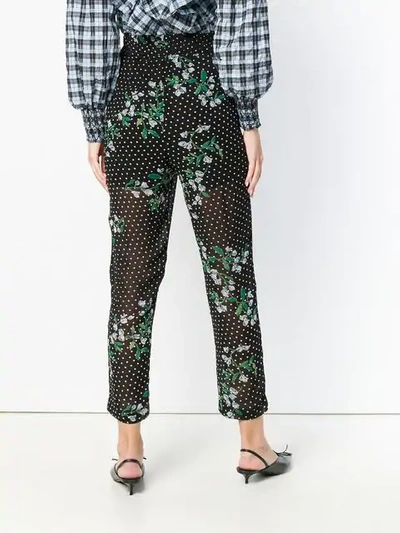 Shop Ganni Floral Dotted Trousers In Black