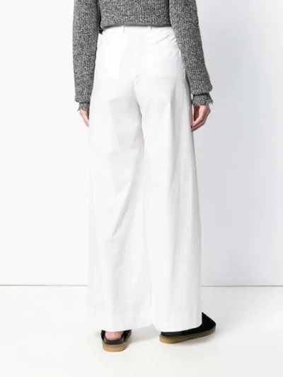 Blanca Flared High-waist Trousers In White