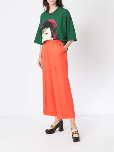 Shop Undercover Flared High-waisted Trousers - Orange