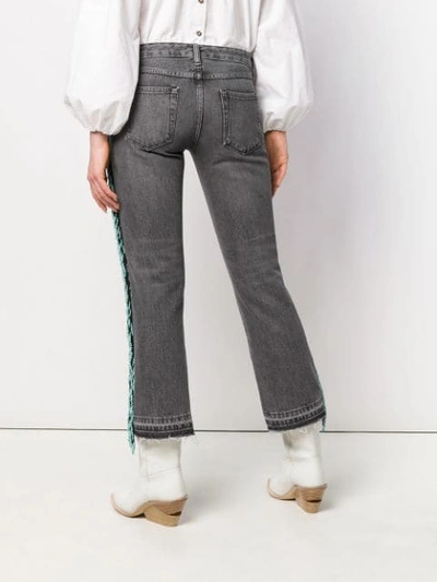 Shop Alanui Bead Fringed Cropped Jeans In Grey