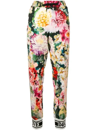 Shop Dolce & Gabbana Floral Print Trousers In Black