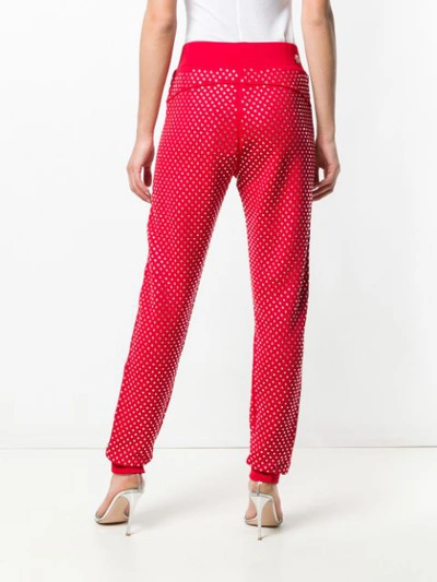 Shop Philipp Plein Crystal Embellished Track Pants - Red