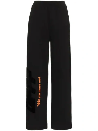 Shop Off-white High Waisted Text Print Cotton Trousers In Black