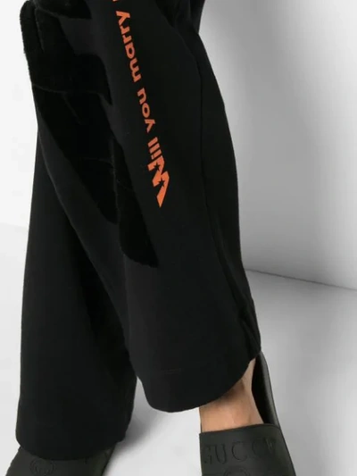 Shop Off-white High Waisted Text Print Cotton Trousers In Black