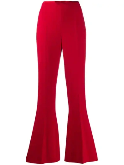 Shop Miu Miu Flared High Rise Trousers In Red