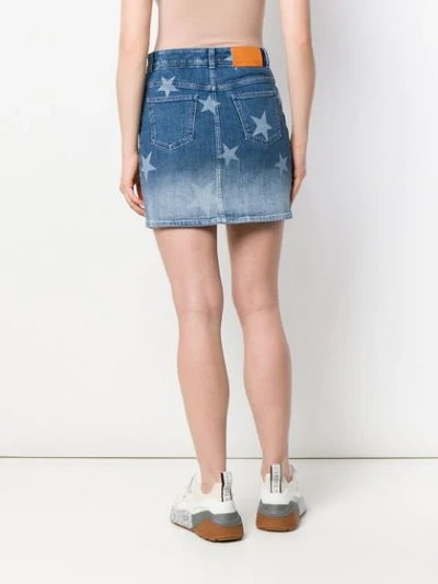 Shop Stella Mccartney Star Print Denim Skirt In Blue